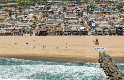 A true coastal haven, positioned mere moments from the shoreline, enjoy easy beach access with the waves and boardwalk practically at your doorstep