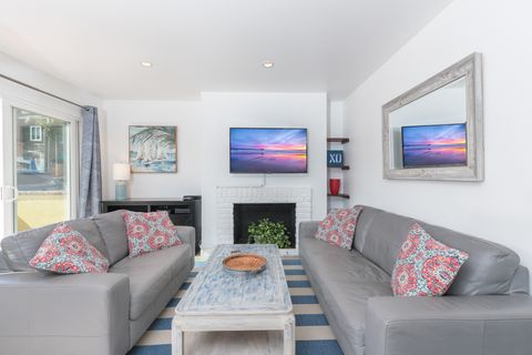 This downstairs unit sits just 10 houses from the sand and is the perfect home base for a trip to the beach.